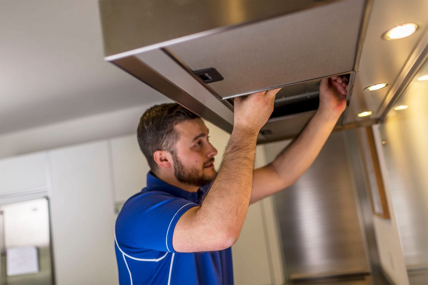 Kitchen hood installer fitting commercial canopy in Aberdeen